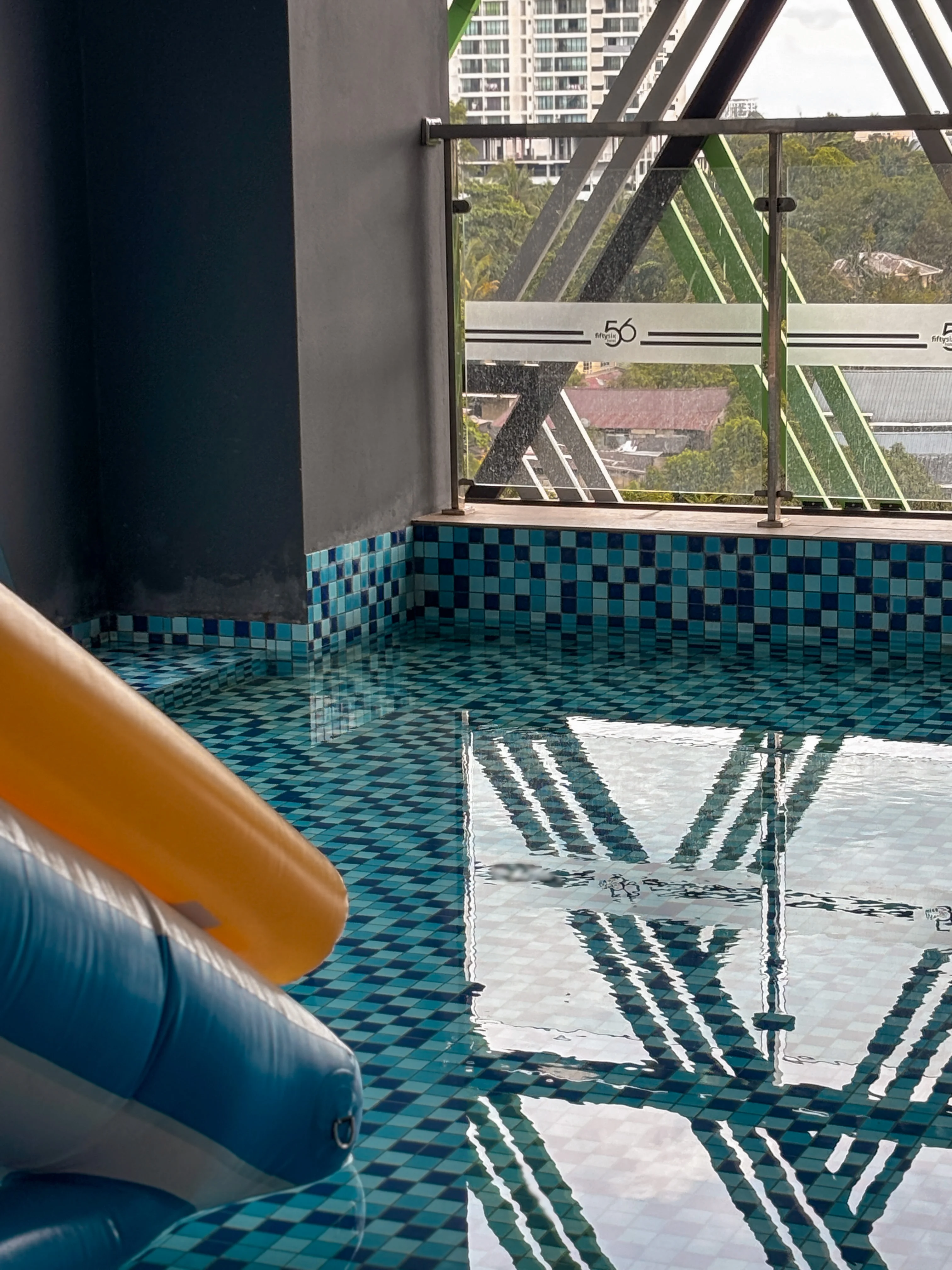 Rooftop swimming pool photo at 56 Hotel Kuching