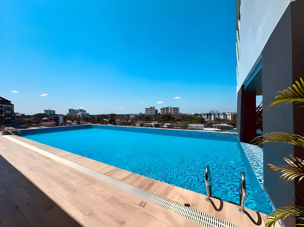 Rooftop swimming pool leisure area at 56 Hotel Kuching