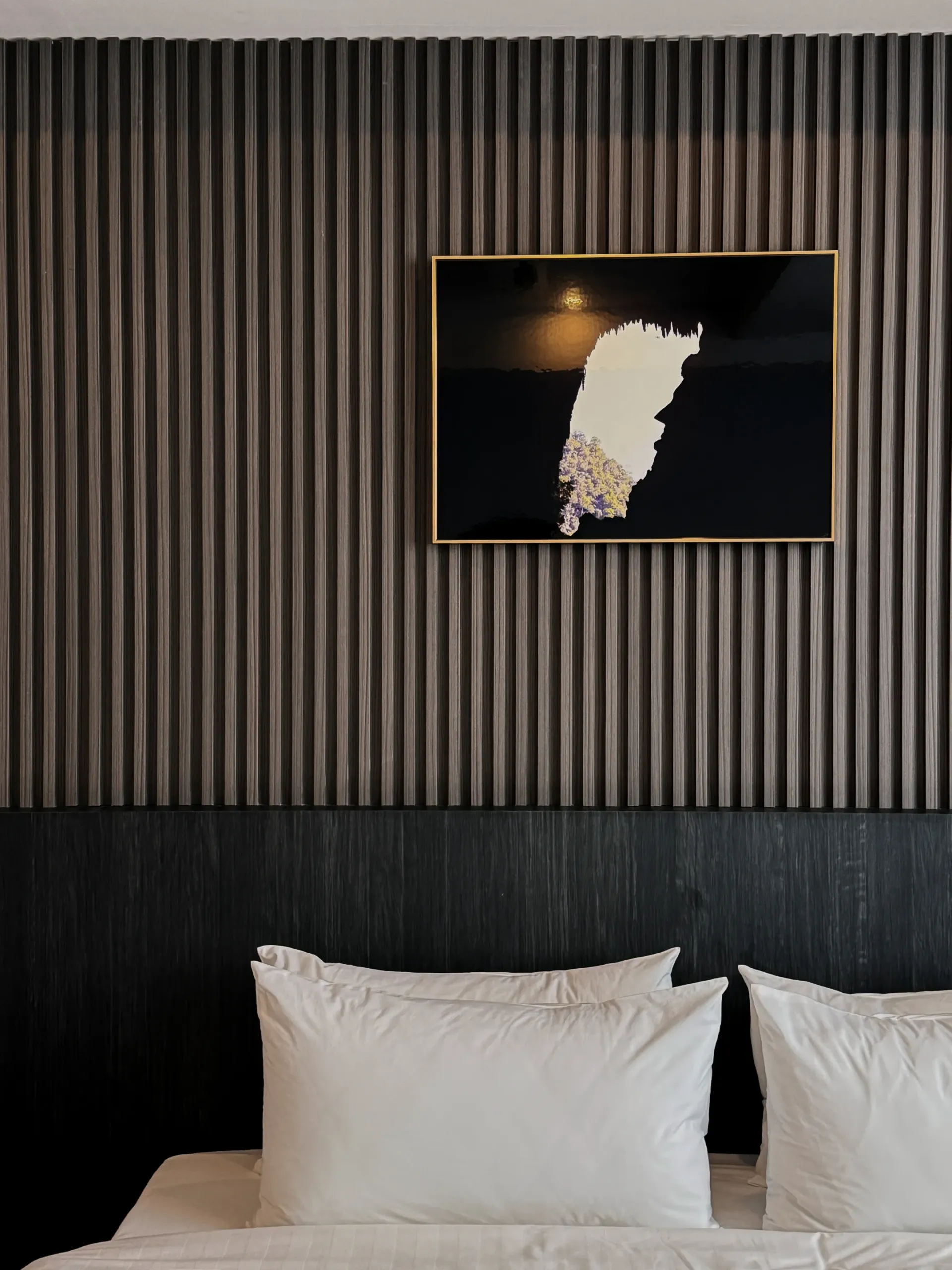 Bed and interior styling at 56 Hotel Kuching